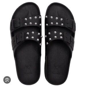 Sleek Black and Silver Sandals with Modern Design